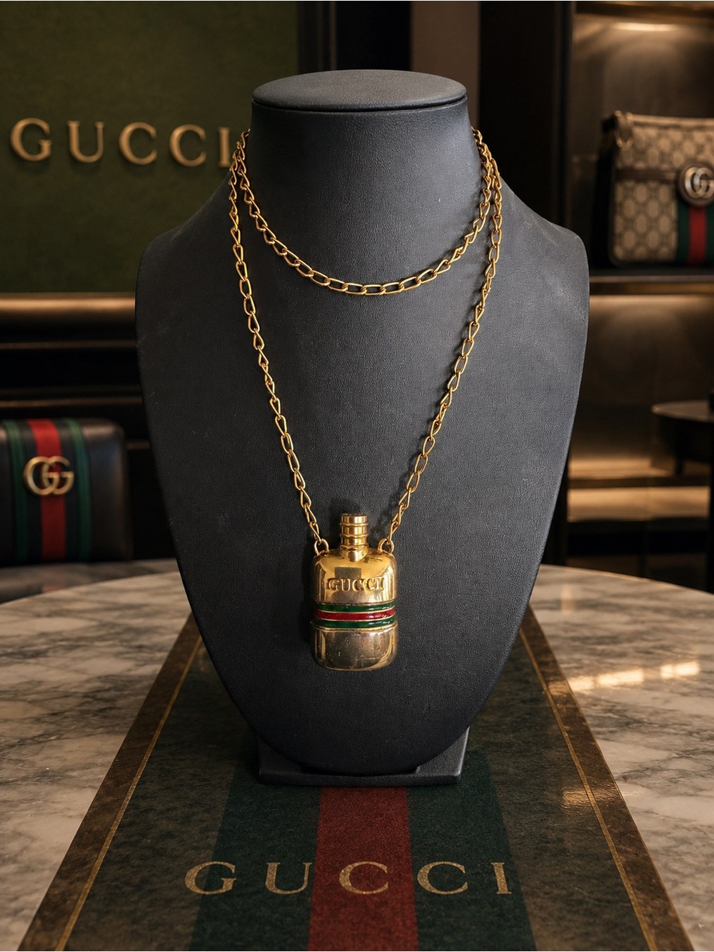 Rare, iconic vintage Gucci perfume bottle necklace from the 1970s/1980s.
